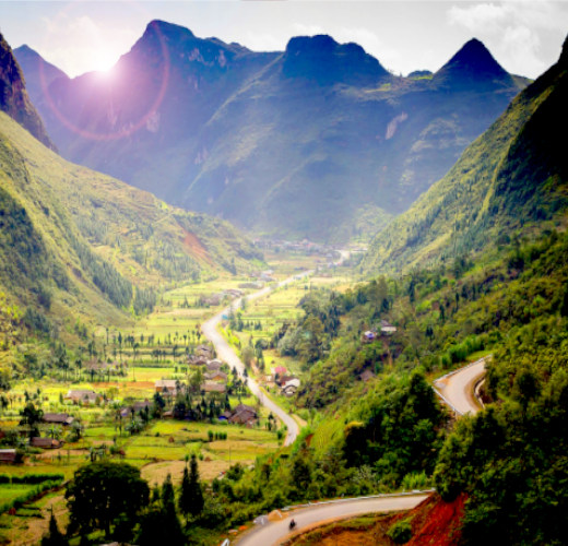 Narrow road through mountains on the Ha Giang Loop.