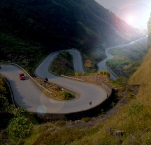 Road snaking through the Vietnamese mountains on the Ha Giang Loop