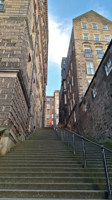 Advocates Close with its steep stairs, capturing the historic charm of Edinburgh’s architecture
