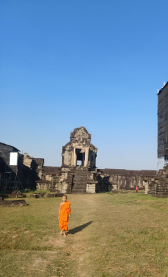 Child Monk at Angkor Wat Child monk wearing orange robes at Angkor Wat in Cambodia