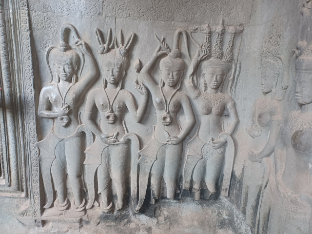 God Dancer Carvings at Angkor Wat Carvings of god dancers in stone inside Angkor Wat