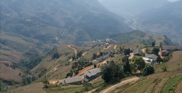 Winding Road Panorama – Ha Giang Loop, North Vietnam Panoramic view of the winding road through the mountains on the Ha Giang Loop, North Vietnam