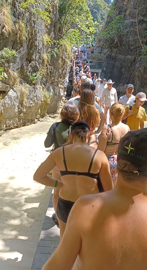 Busy Maya Bay – Tourists Exiting, Phi Phi Leh Maya Bay packed with tourists exiting the beach, Phi Phi Leh