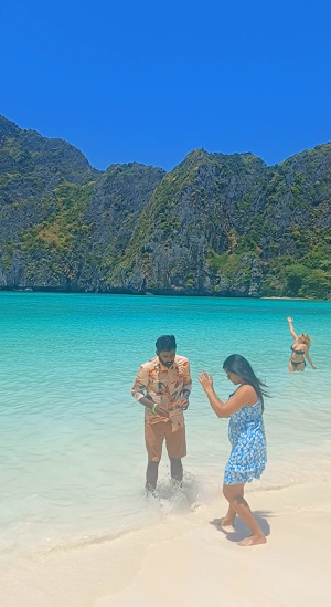 Tourists in the Water at Maya Bay – Phi Phi Leh Tourists enjoying the water at Maya Bay, Phi Phi Leh