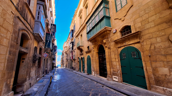 Narrow Streets of Valletta at Sunset – Malta Narrow streets of Valletta illuminated by sunset