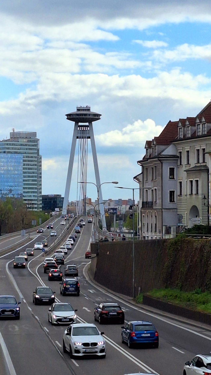 UFO Bridge in Bratislava – Busy with Traffic Front view of UFO Bridge in Bratislava bustling with road traffic