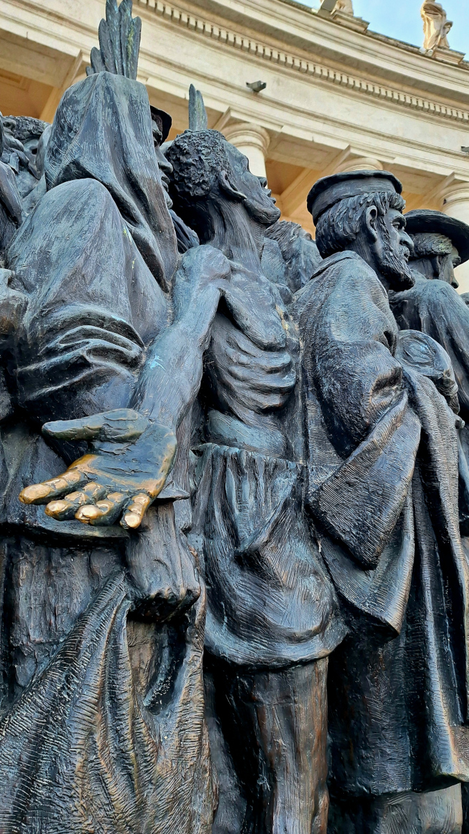 Outstretched Hand Close-Up – Angels Unawares Statue, Vatican City Close-up of the outstretched hand of a starving man on the Angels Unawares statue in Vatican City
