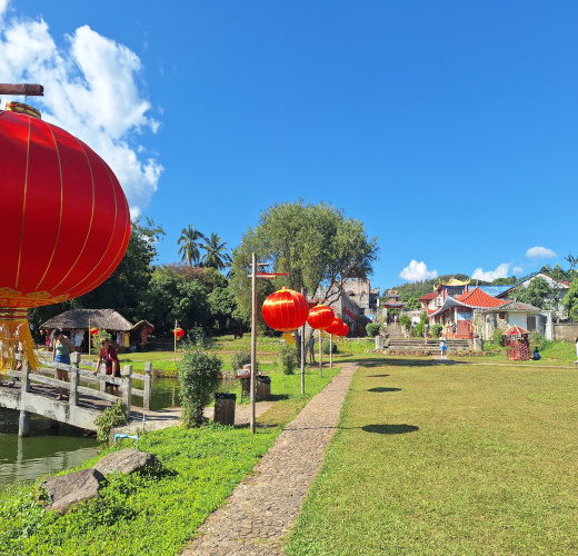 Bright red lanterns adorning the path in Chinese Village.