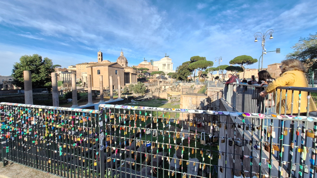 Love Padlocks with Forum of Trajan – Rome, Italy Padlocks symbolizing love with the Forum of Trajan in the background, Rome