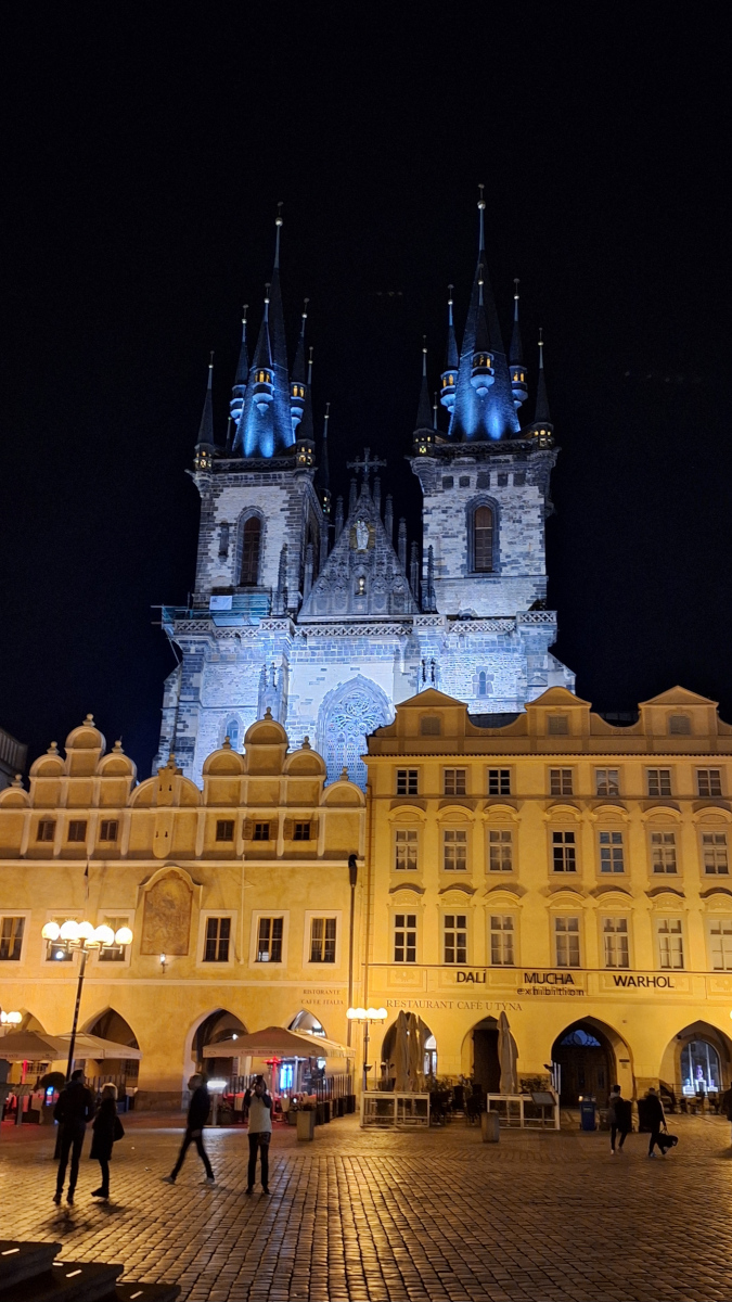 Prague Old Town Square at night showcasing iconic architecture