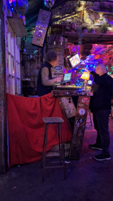 DJ in a booth at a ruin bar in Budapest