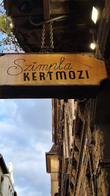 Simpla Kertmozi sign at the entrance of ruin bars in Budapest