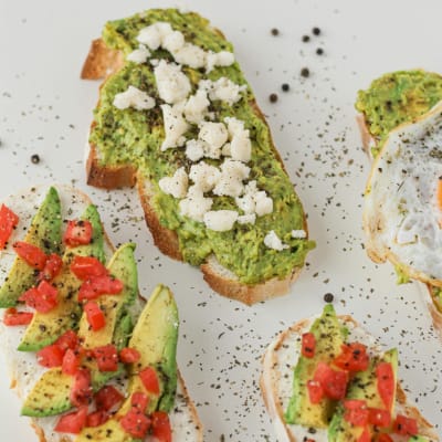 Bread Selection – Avocado and Pesto Topped at Termini Food Court, Rome Selection of breads topped with avocado, tomato, pesto, and crumbled cheese from Termini Food Court