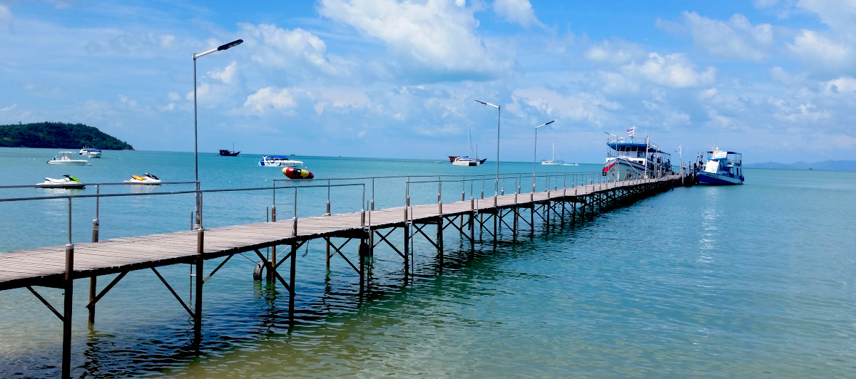 Scenic Wooden Pier on Koh Samui: Ferry to Koh Phangan Ferry from Samui to Koh Phangan on the Banana Pancake Trail