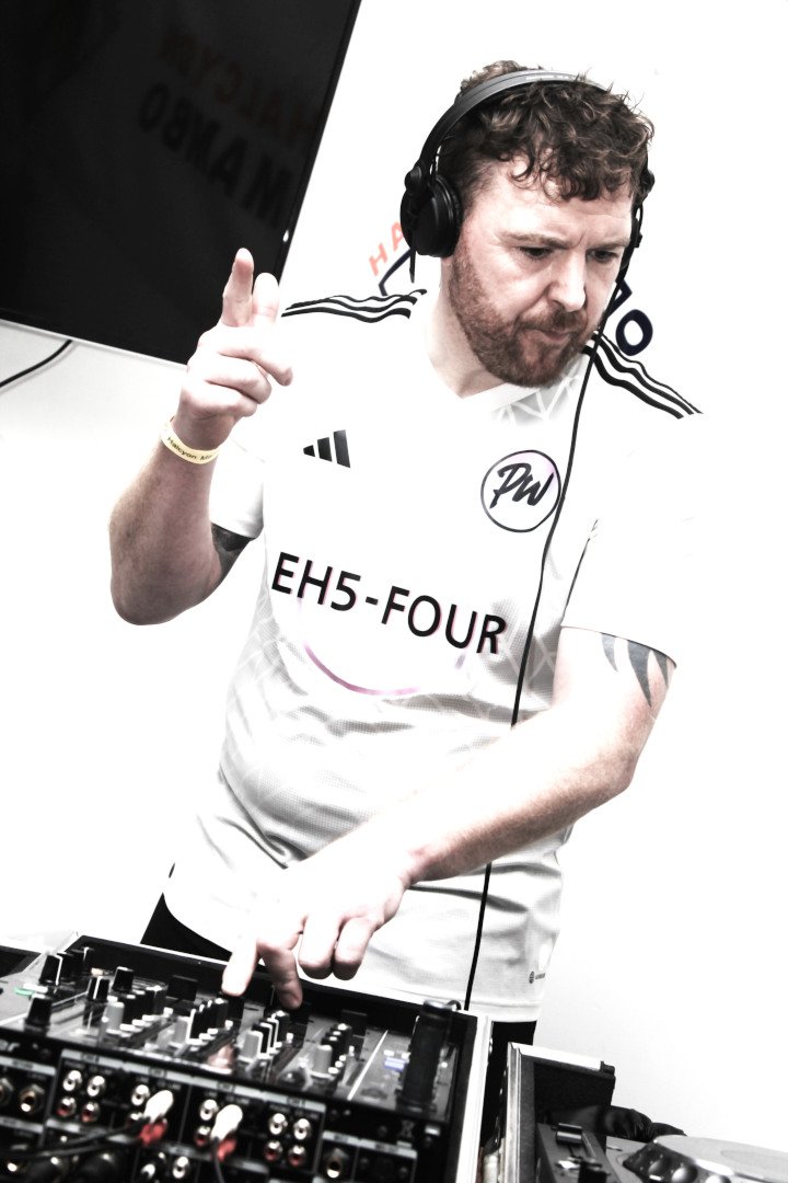 DJ Dancing in Rhythm to House Music He Is Playing DJ dancing to house music tunes he is playing, perfectly in rhythm