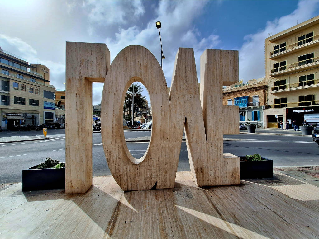 Unique ‘Love’ Installation in St. Julian’s, Malta Quirky 'Love' statue installation in St. Julian's, Malta, featuring the word reversed