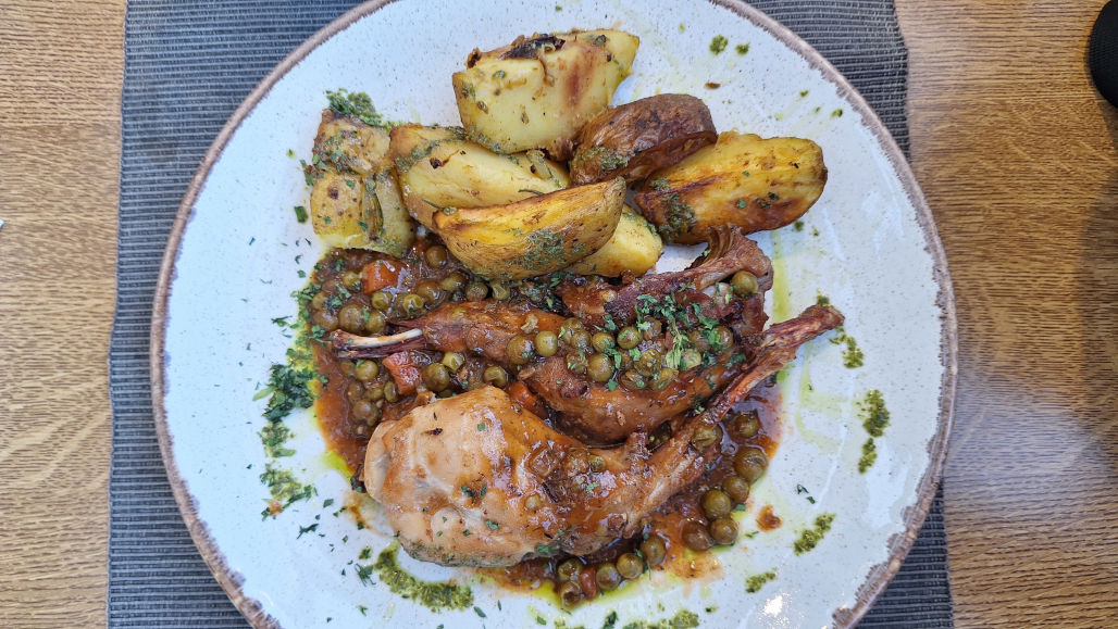 Delicious Maltese Rabbit with Potatoes Traditional Maltese dish of rabbit served with potatoes