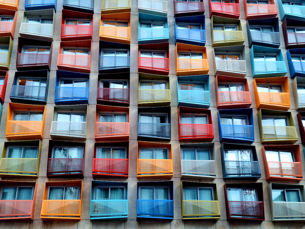Colourful Balconies of a St. Julian’s Hotel Close-up abstract image of a hotel in St. Julian's, featuring balconies painted in different colours for a striking effect
