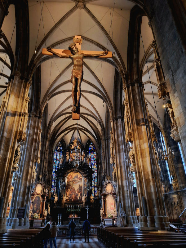 Crucifixion of Jesus in St. Stephen’s Cathedral, Vienna Image of the Crucifixion of Jesus hanging on a cross from the roof of the interior of St. Stephen's Cathedral in Vienna