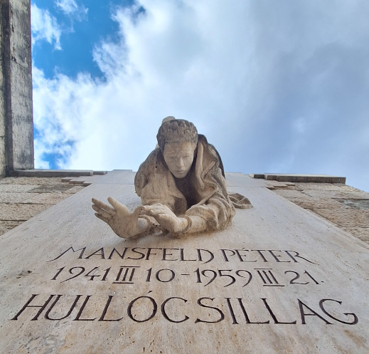 Peter Mansfeld memorial in Budapest, an unusal perspective with the fluffy clouds in the background